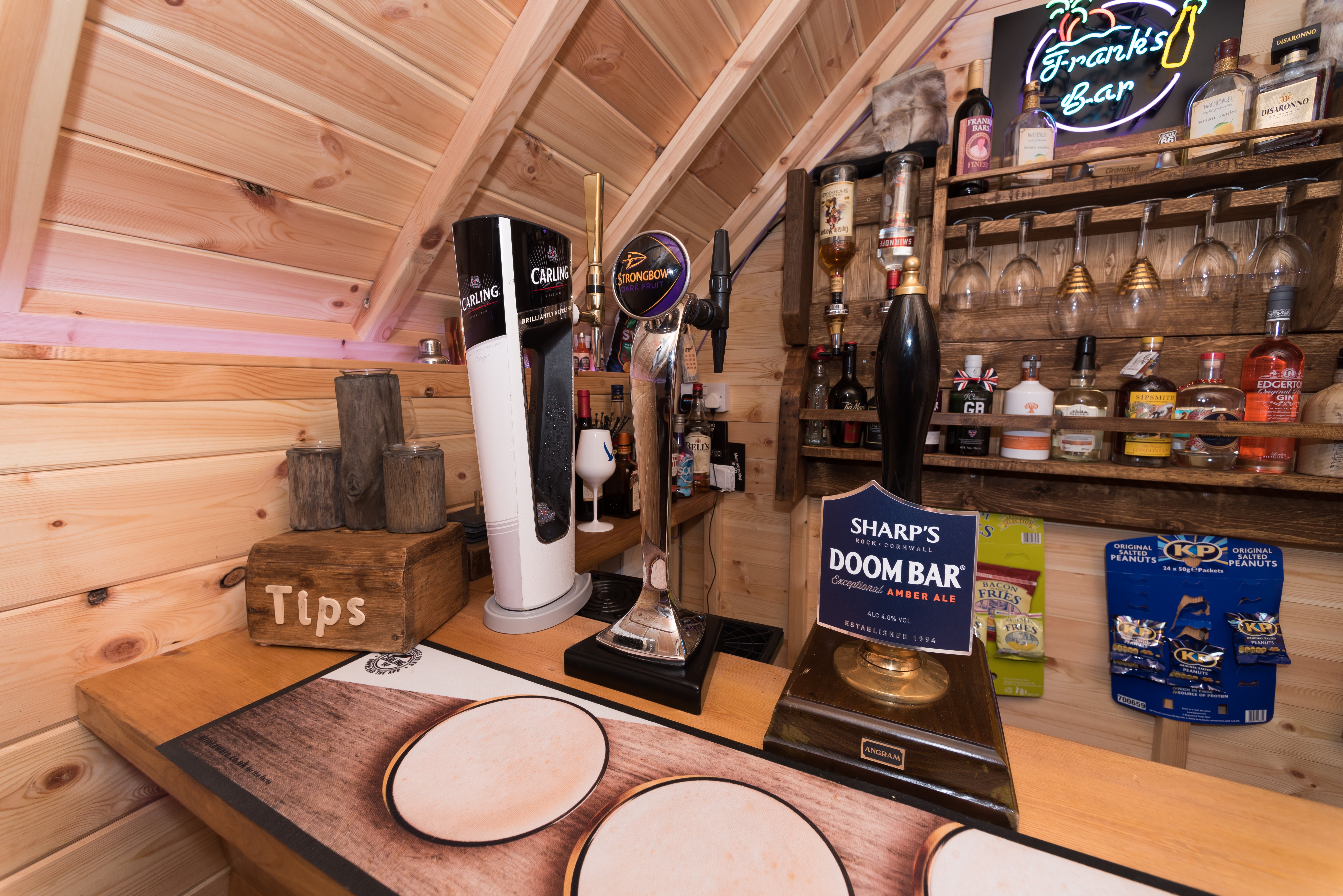 Arctic Cabins 10m garden bar with a BBQ grill