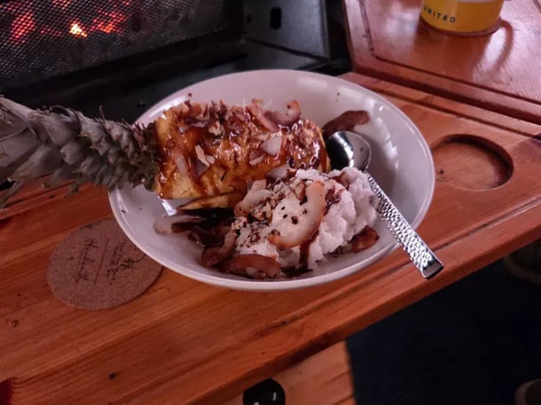 Grilled pineapple with rum caramel sauce and homemade coconut ice cream