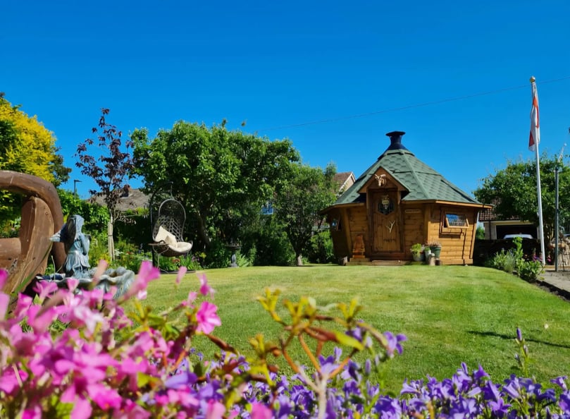medium sized arctic cabin in the garden
