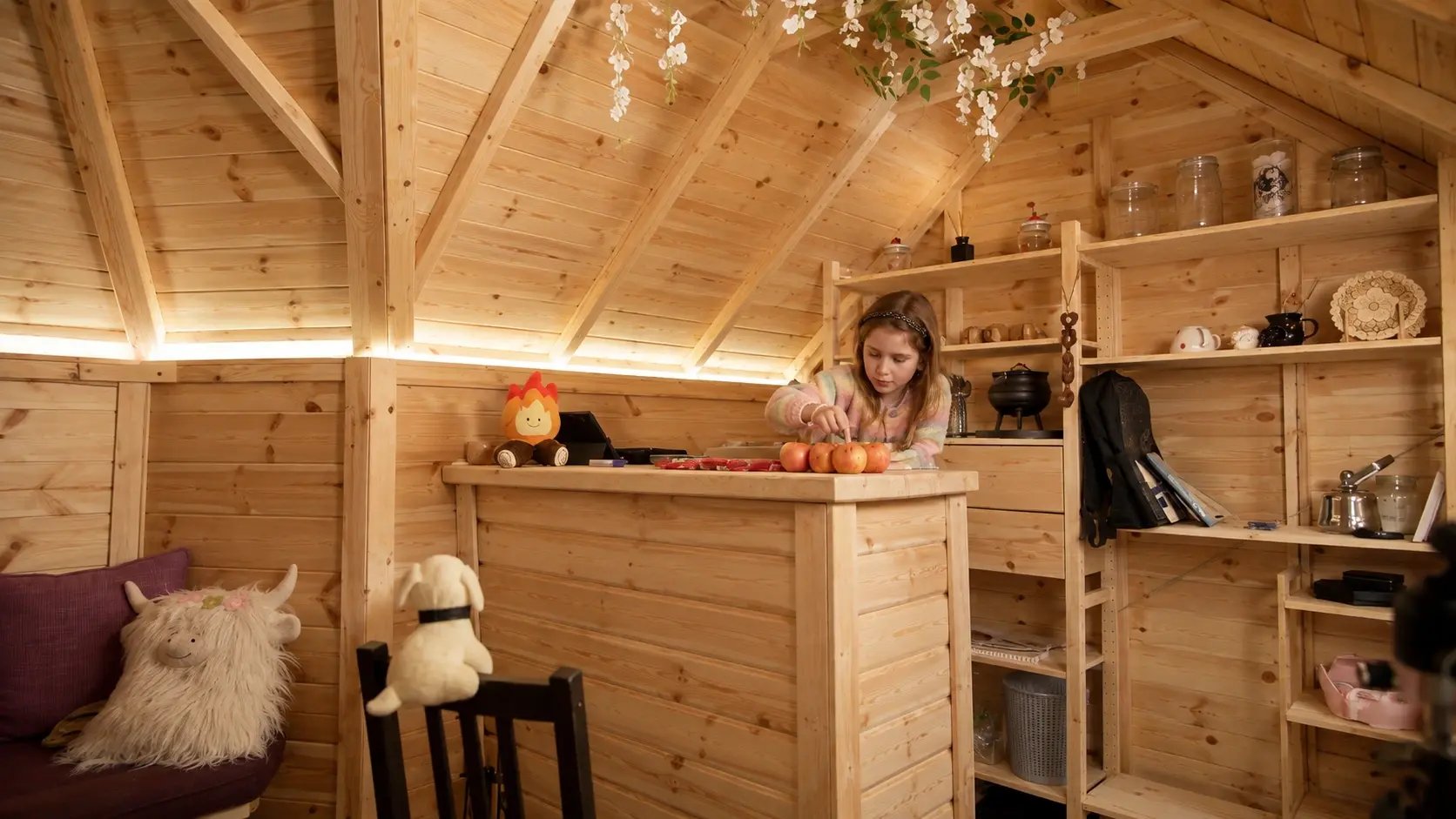 child playing games in an arctic cabin