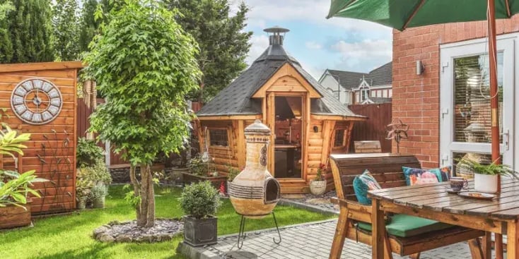 small bbq cabin with door open