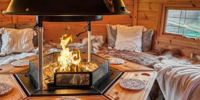 inside a bbq hut with fire roaring