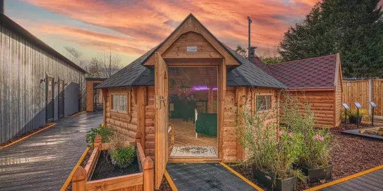 Vinnie Jones estate with arctic cabins vans parked