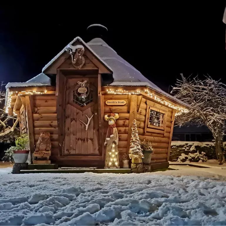 snowy arctic cabin