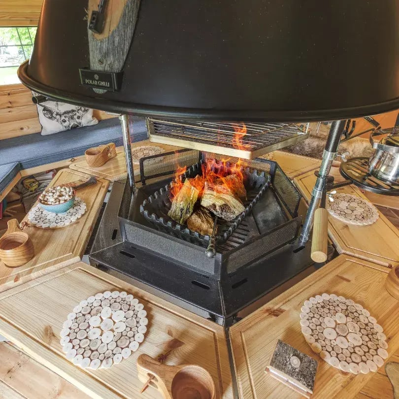fire on inside a bbq cabin