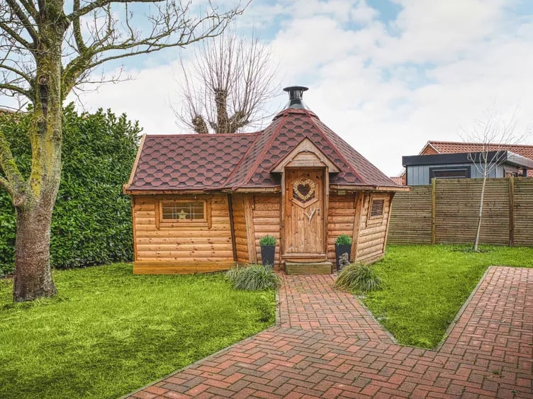 garden bar cabin with red roof