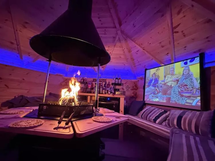 cinema screen inside an arctic cabin