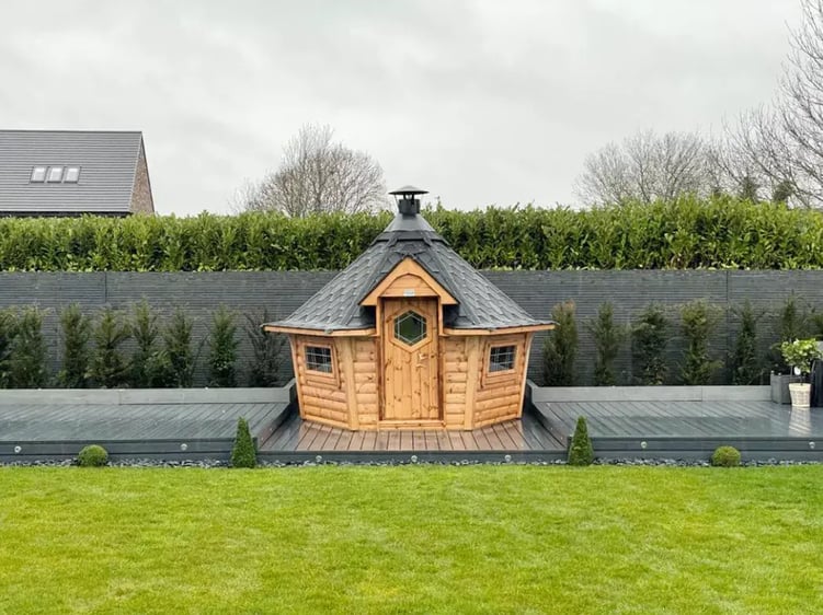 small bbq cabin in modern urban garden space