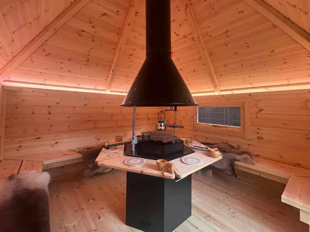 Inside a BBQ hut with mood lighting creating calm social environment 