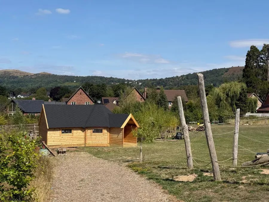 timber garden cabin with extension