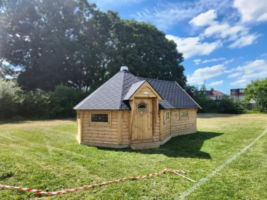 large wooden cabin with side extensionmages-extended-15-6a102dd4d4bc4