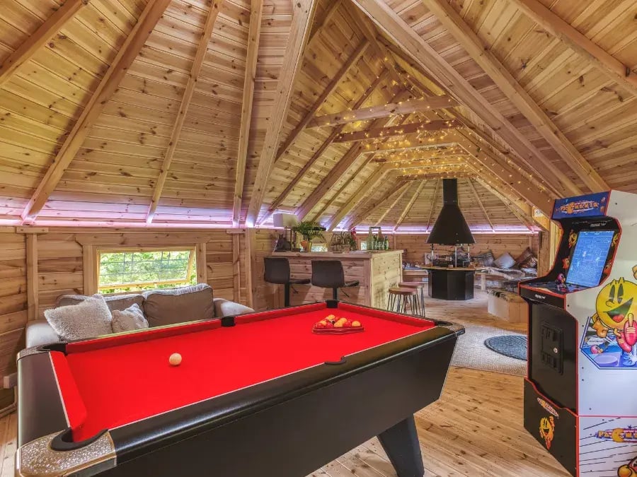 Scandinavian bbq hut with pool table and games area