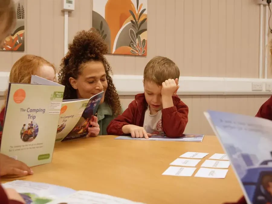children reading inside a classroom