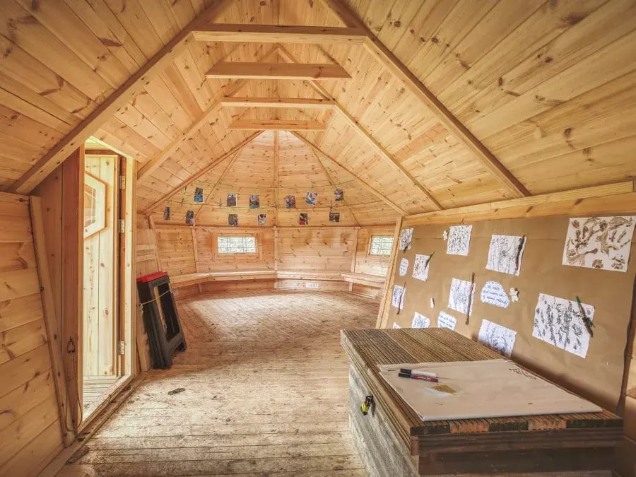 inside a scandinavian hut decorated for learning