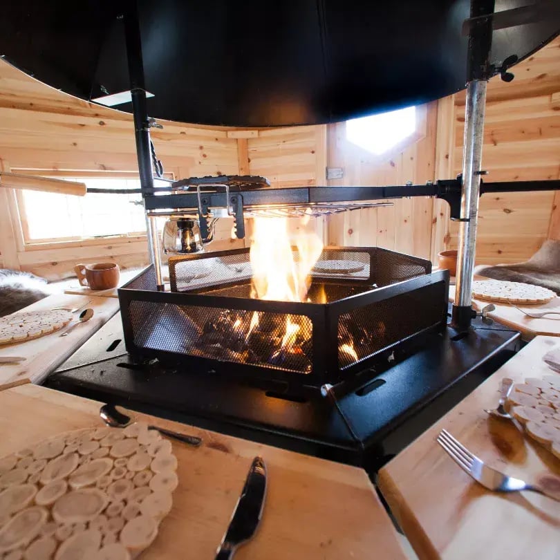 inside bbq cabin with fire lit
