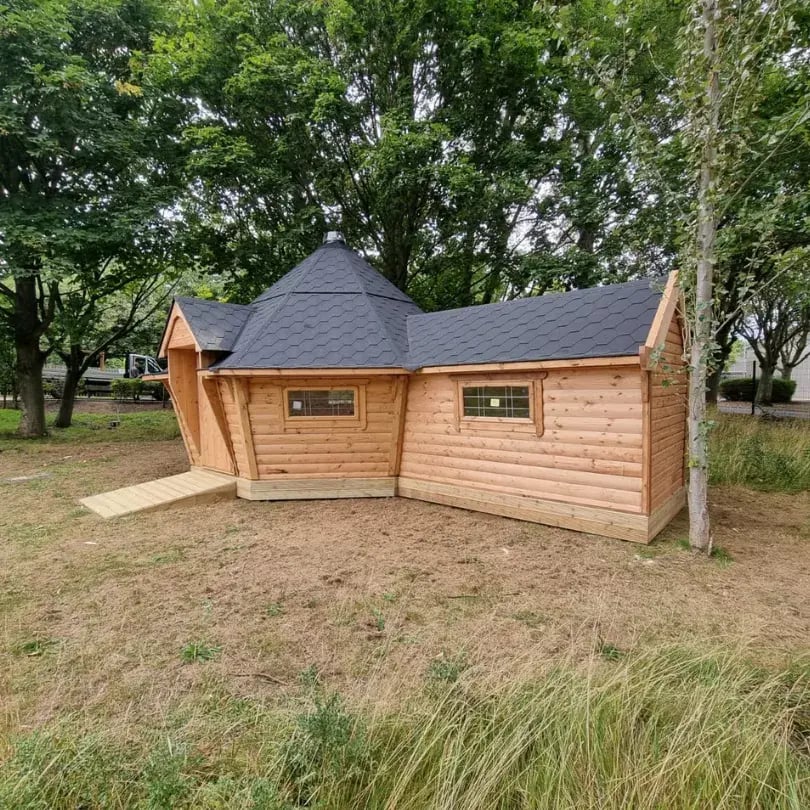 scandinavian log cabin with ramp