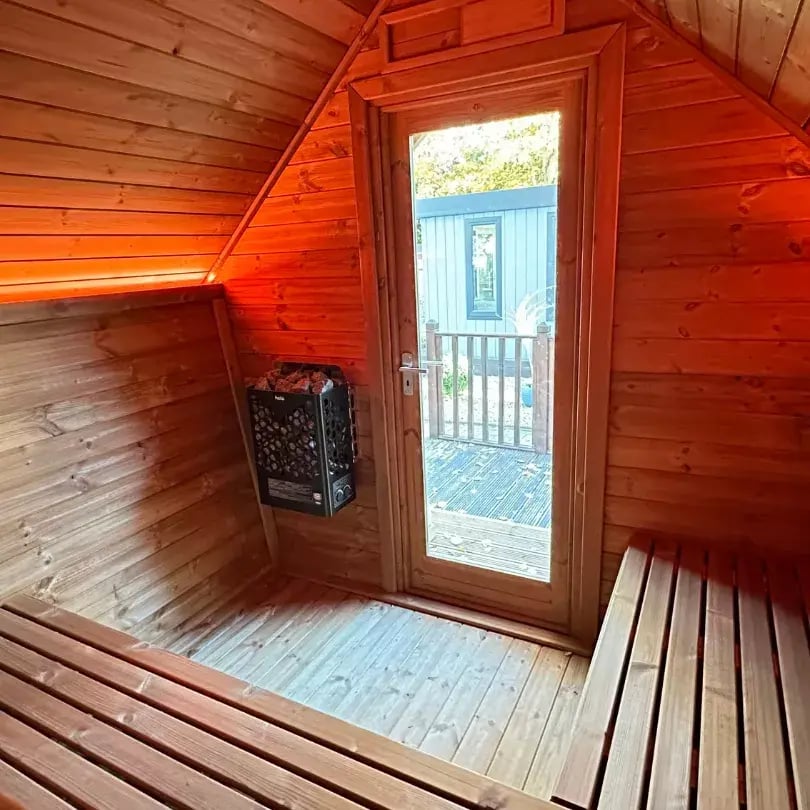 looking out from inside a sauna cabin