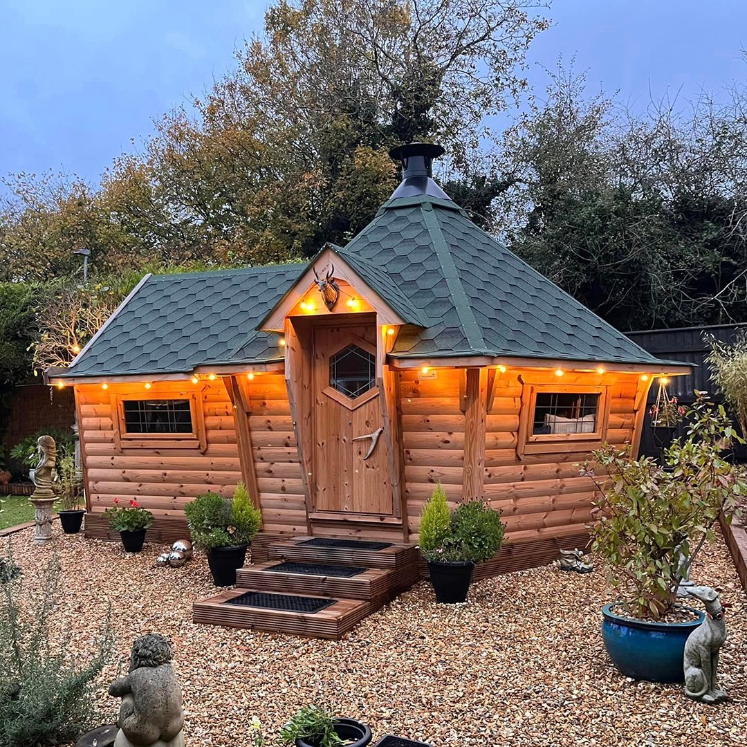 Arctic Cabins 10m garden bar with a BBQ grill