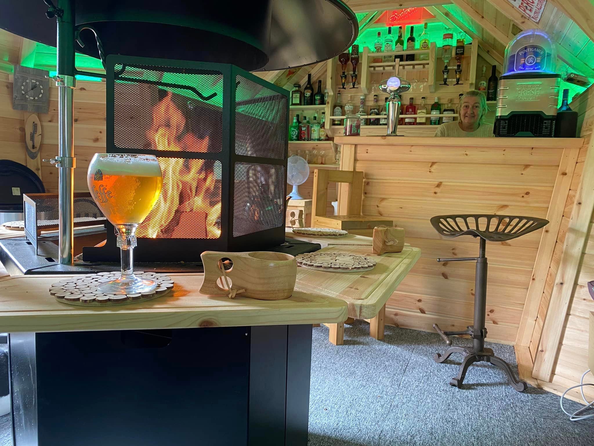 Inside Arctic Cabins BBQ Hut with Bar, drinks rack & BBQ grill