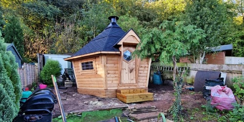 Arctic Cabins BBQ house in mature garden