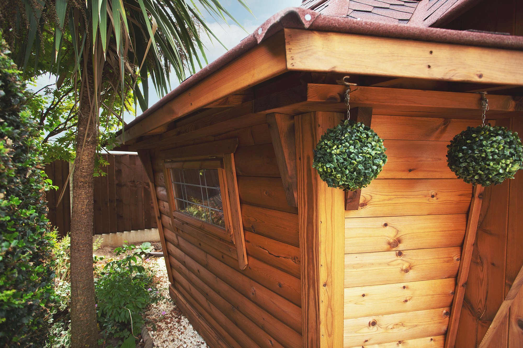 Close up of the exterior of Arctic Cabin with hanging faux trees