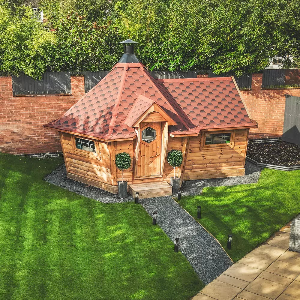 Arctic Cabins 10m garden bar with a BBQ grill