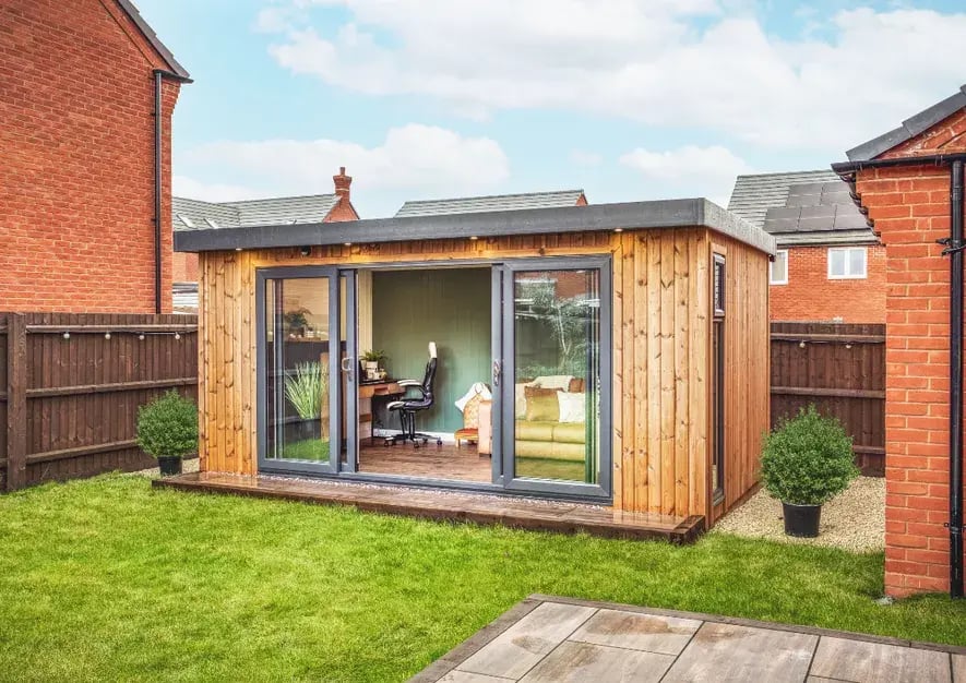 timber garden building in new build garden