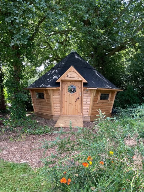 wooden hut for the playground