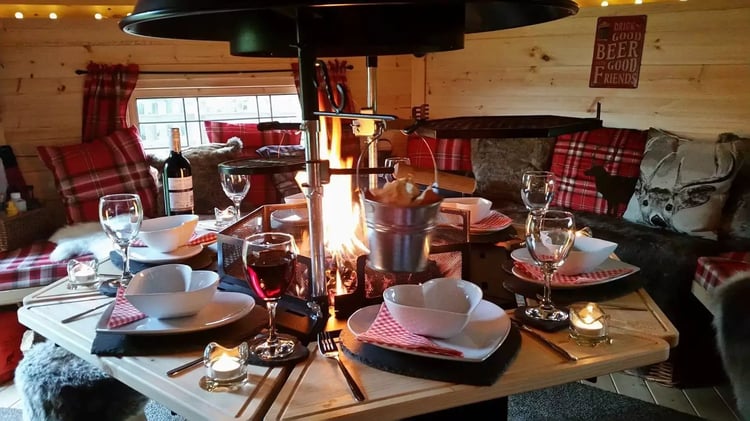 valentines date night table set up inside a bbq hut